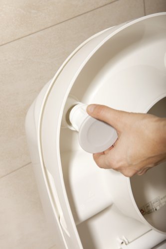 Etac Cloo Toilettensitzerhöhung weiß mit Armlehnen montiert auf WC